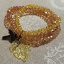 Bracciali Autunno in cristalli ambra, beige e giallo con ciondolo ombrello e foglia gialla