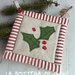 Presina natalizia con ramo di trifoglio e bordo patchwork