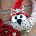 Ghirlanda fuoriporta natalizia con gufetto, stelle di Natale e scritta "Peace" in feltro