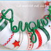 Ghirlanda natalizia Auguri con nastrini sonagli e feltro in rosso e verde