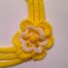 Sciarpa collana multifili in lana gialla e bianca a tricotin, con fiore all'uncinetto, fatta interamente a mano