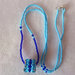 Collana lunga di perline, turchese e blu, con pendente