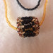 Collana lunga di perline con pendente di perline, nero e oro