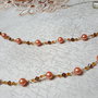 collana lunga con perle in vetro arancioni e swarovski