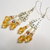Orecchini pendenti chandelier con perle e cristalli gialli, idea regalo.