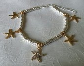 Bracciale in metallo color argento con ciondoli stelle marine