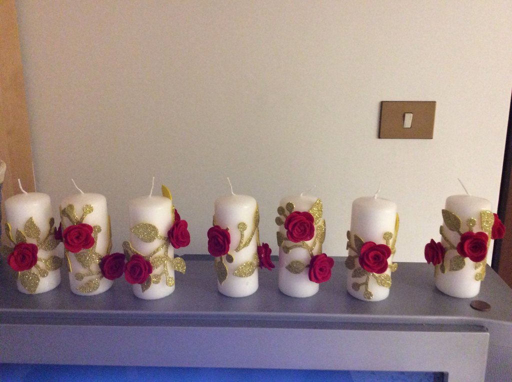 Candele decorative natalizie