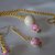 Collana e orecchini con perle in ceramica