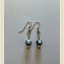 Orecchini pendenti fatti a mano con perle