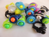 Anello twister vari colori con perla Swaovski da 10 mm