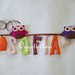 SOFIA: una ghirlanda di lettere in stoffa colorate come appoggio per due gufetti!