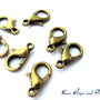 LOTTO 10 moschetti color bronzo (12x6mm) (cod.01142)