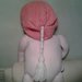Cappellino in lana rosa per bambina