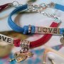 COPPIA BRACCIALI DONNA UOMO  - LOVE - AMORE - CHIAVE - MANETTE - ROSSO - BLU 