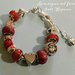 Bracciale metallo perle foro largo rosso ruggine e cuori
