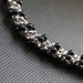 Bracciale con cristalli metallic argento e perle nere