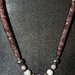 Collana in rete tubolare con cristalli swarovski e perle