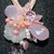Collana rosa con pendente di perle , pietre e cristalli rosa