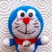 Doraemon amigurumi simpatico e divertente, fatto a mano all'uncinetto, con dettagli in feltro e vero campanellino