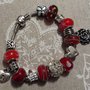 Bracciale metallo perle foro largo rosse con cuori