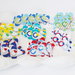 Etichette per i contenitori di caramelle del vostro candy table a tema 'Aeroplanini tra le nuvole': colorati aeroplani per indicare il gusto dei vostri dolcetti