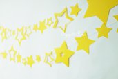 Ghirlanda di stelle di carta: una graziosa decorazione composta da varie tipologie di stelle