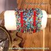 Bracciale crochet e perline “Celeste e Corallo”
