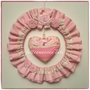 Fiocco nascita tondo in cotone rosa con pizzo,roselline e cuore patchwork