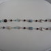 Collana lunga con perle in pasta polimerica millefiori azzurro-marrone
