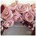 Corona in legno con rose di lino rosa