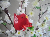 Uccellino primavera rosso