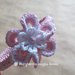 Cerchietto - cerchiello bambina rivestito a maglia in cotone rosa con fiore all'uncinetto