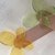 Segnalibro con farfalla in plastica colorata arancio o verde e sacchettino con confetti 