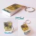 Portachiavi miniatura libro con copertina plastificata
