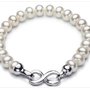 Bracciale realizzato con perle naturali coltivate e chiusura connettore infinito placcato argento idea regalo per lei