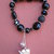 Bracciale nero elastico con charms pendenti