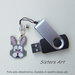 Ciondolo "Coniglietto" per USB realizzato con perline Miyuki delica