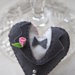 BOMBONIERA da MATRIMONIO in feltro.Cuore che rappresenta un abito da sposo.Applicata rosellina e mezze perle.