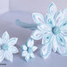 Fiore  kanzashi per capelli colore bianco e azzurro