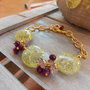 Bracciale giallo e viola