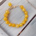 Bracciale giallo oro