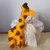 BOMBONIERA adatta a nascita,battesimo,comunione.Unisex.GIOCO.Giraffa in feltro,3 D.Fatta a mano