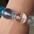 Bracciale elastico pietre trasparenti,azzurre e blu