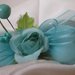 Bomboniera fiocco di iuta e fiore azzurro tiffany