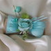 Bomboniera fiocco di iuta e fiore azzurro tiffany