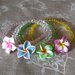 Bracciale cristalli con fiore hawaiano in fimo 