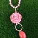 collana in corallo rosa con ciondolo a fiore