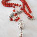Collana lunga rossa con perle di giada e nappa