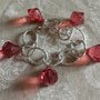 Bracciale catena argentata e pendenti a forma di diamante rosso