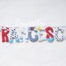 Francesco: una ghirlanda di lettere di stoffa imbottite decorate con miniature in feltro